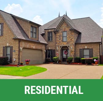 A residential home with a driveway and garage.